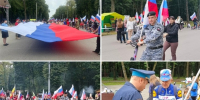 В День Государственного флага России рязанские судебные приставы приняли участие в митинге-концерте и раздали ленты с триколором - УФССП